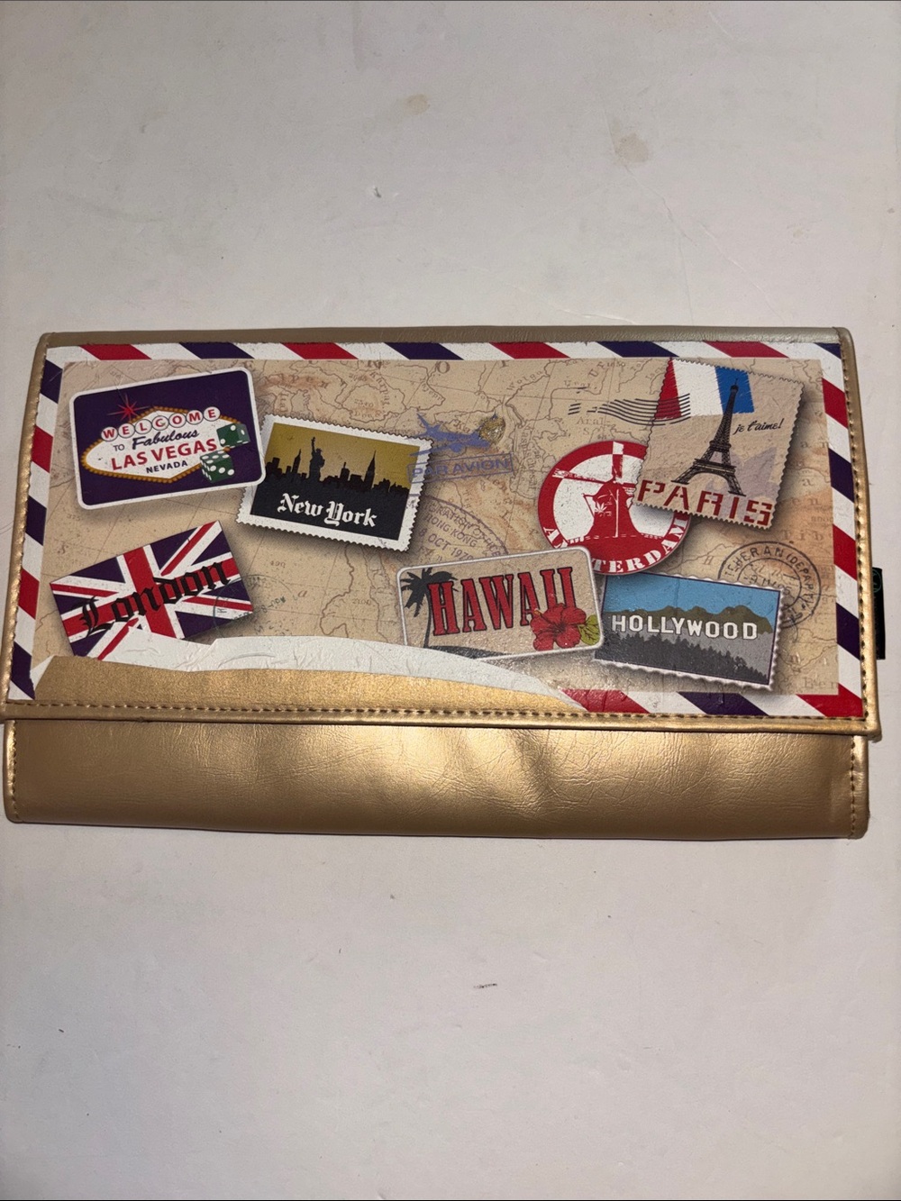 GOLD FAUX LEATHER TRAVEL POUCH WITH WORLDLY DESIGN AND DIVIDERS INSIDE PRELOVED